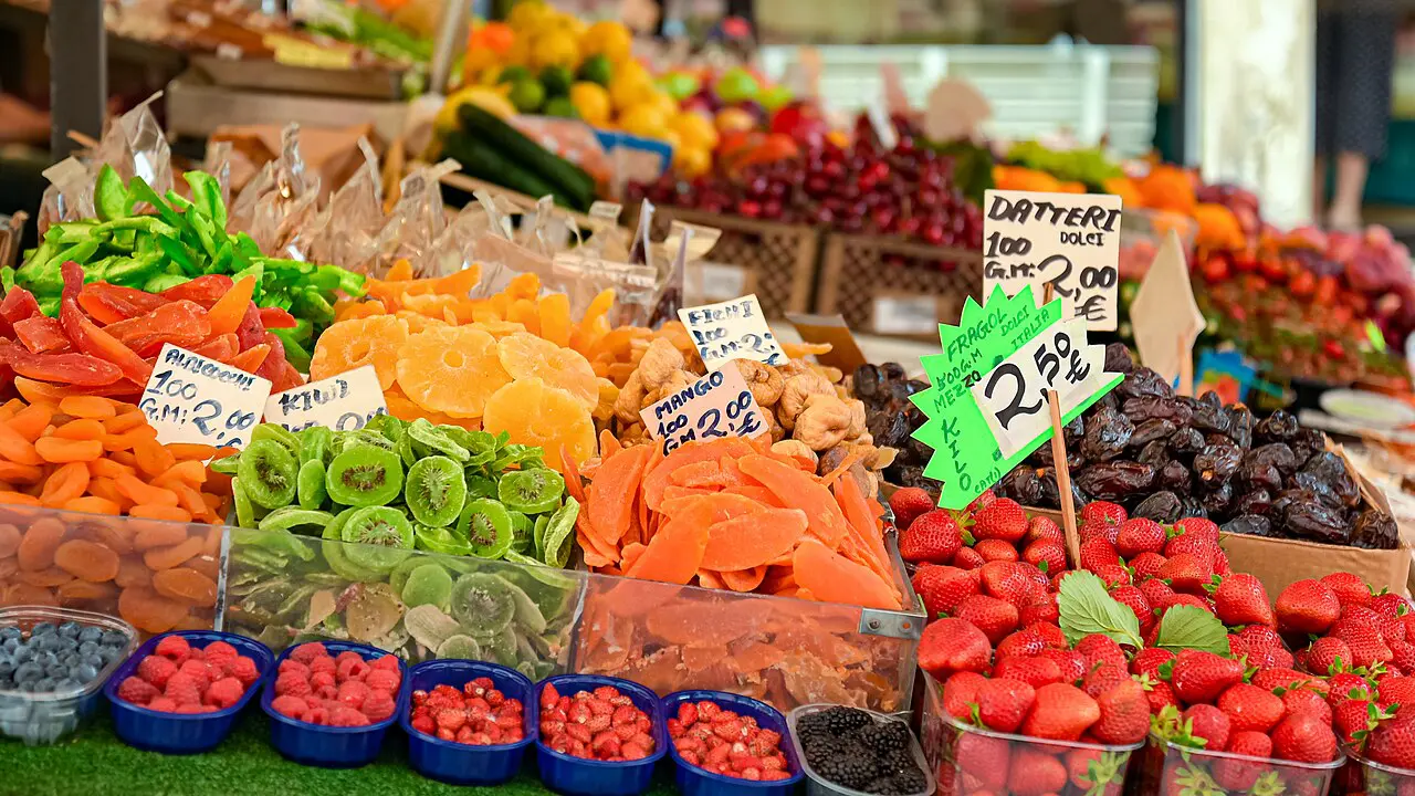 Authentic wide photograph of Rialto market in Venice, where residents shop and everyday living costs are felt