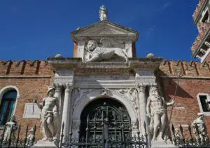 Historic Porta Magna gateway and stone lions at the Venice Arsenale, former shipyard of the Venetian Republic