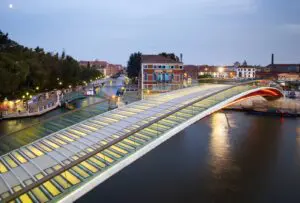Authentic photograph of Santiago Calatrava's glass and steel Ponte della Costituzione across Venice's Grand Canal