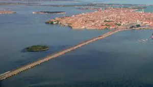 Aerial photograph of Venice's Ponte della Libertà road bridge alongside the nineteenth-century railway bridge across the lagoon