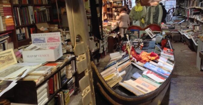 libreria acqua alta - venice book store with gondola