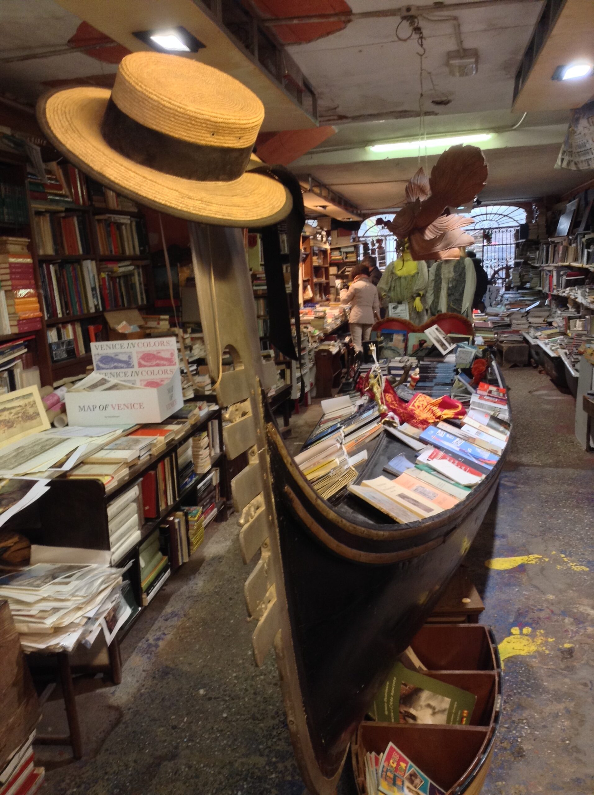 libreria acqua alta - venice book store with gondola