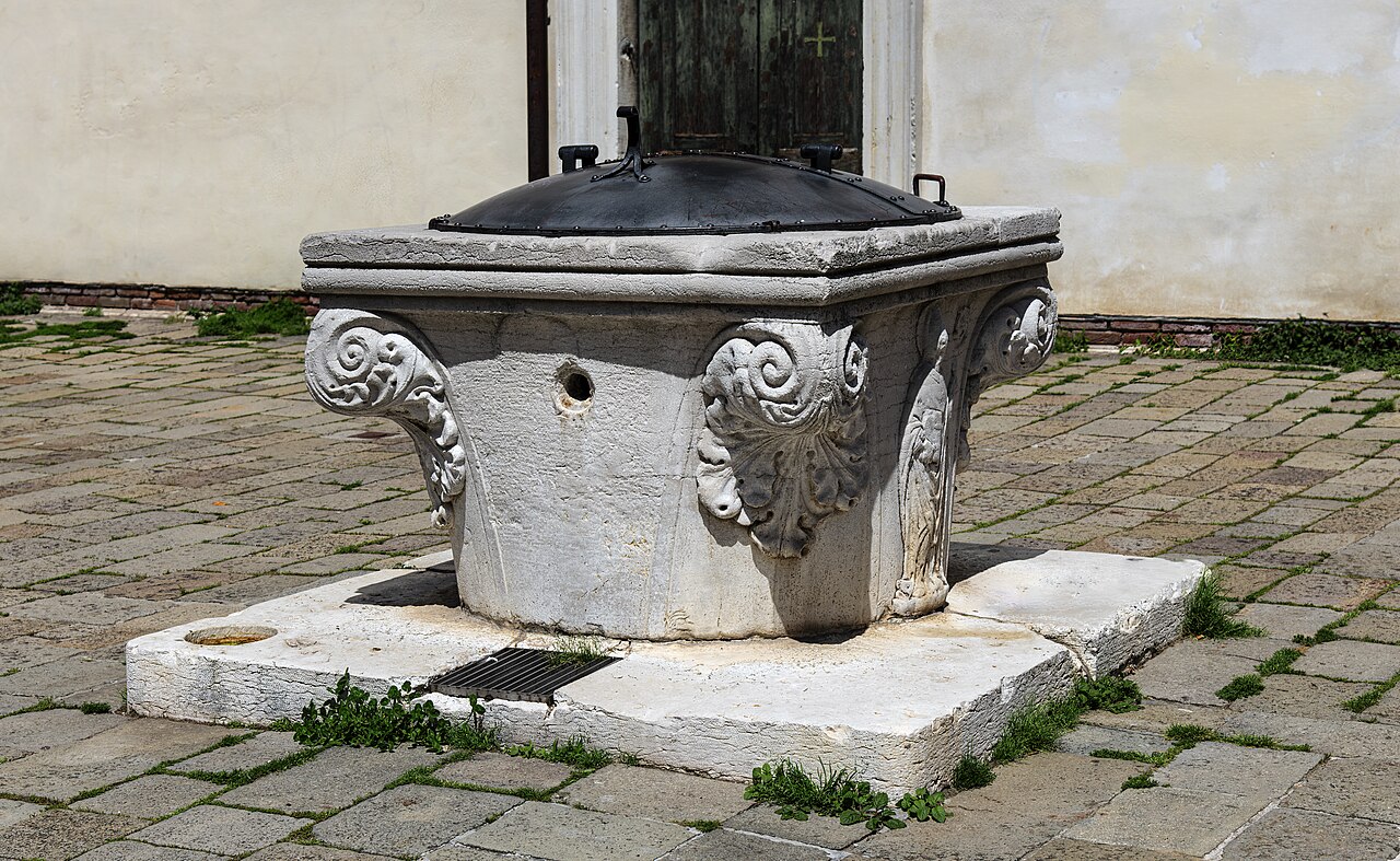 Venetian stone wellhead