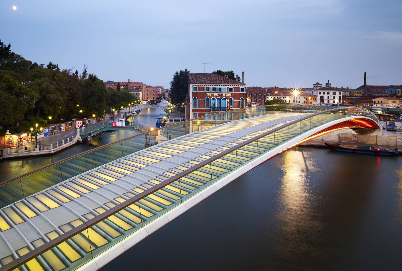 Authentic photograph of Santiago Calatrava's glass and steel Ponte della Costituzione across Venice's Grand Canal